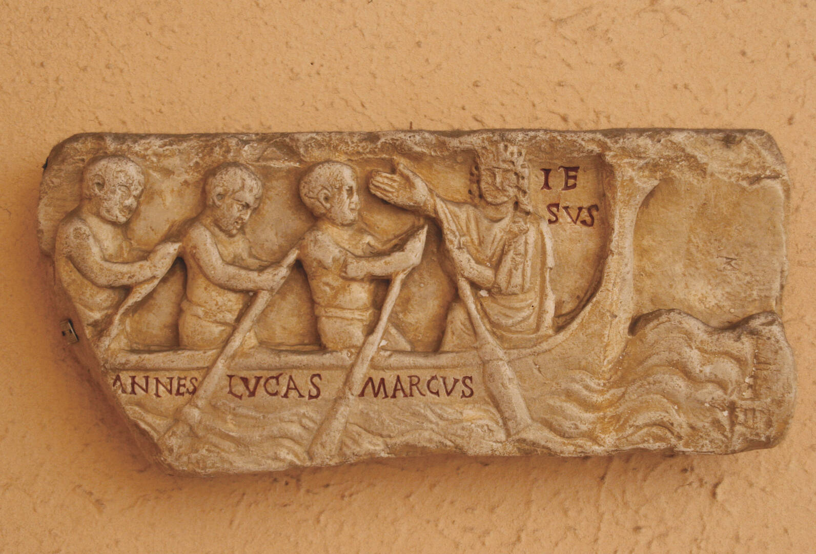 A relief from a fourth-century sarcophagus depicts Jesus in a boat with John, Luke and Mark (Prisma Archivo/Alamy)